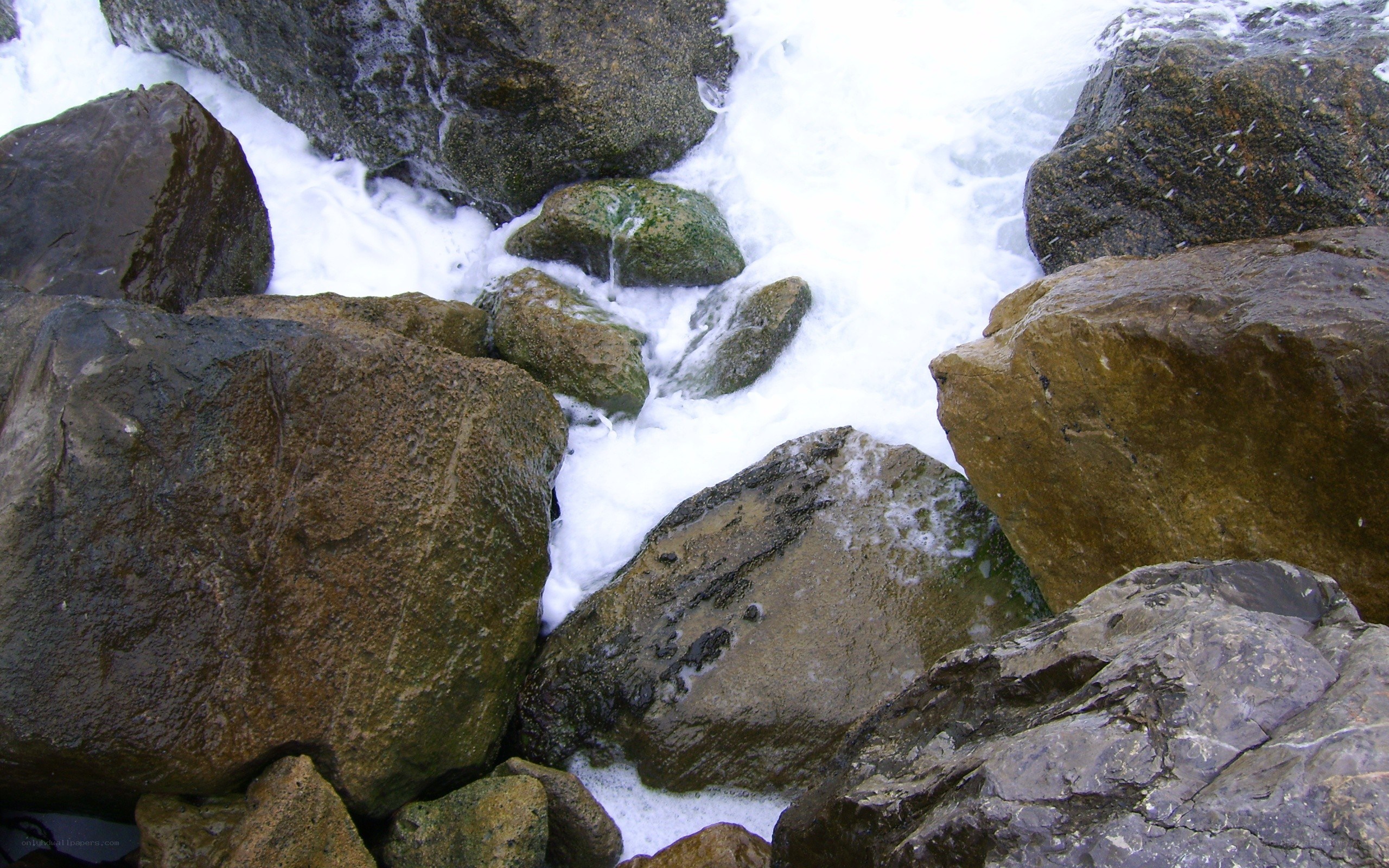 Rocks with crashing waves