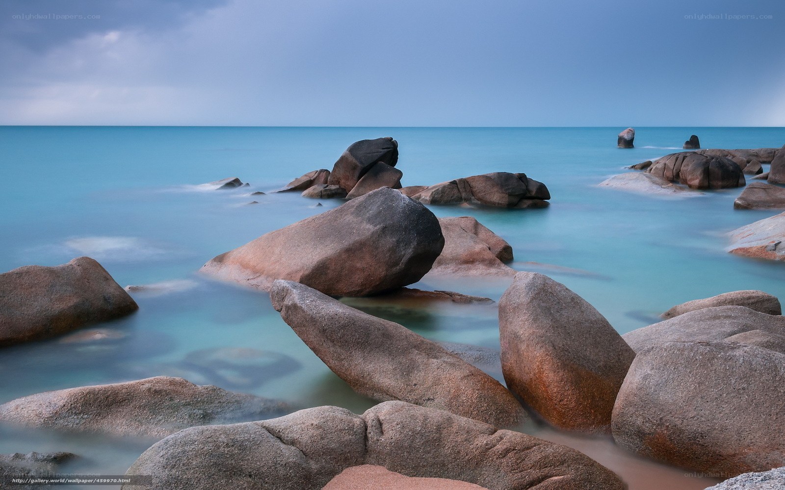 Rocky beach at calm sea