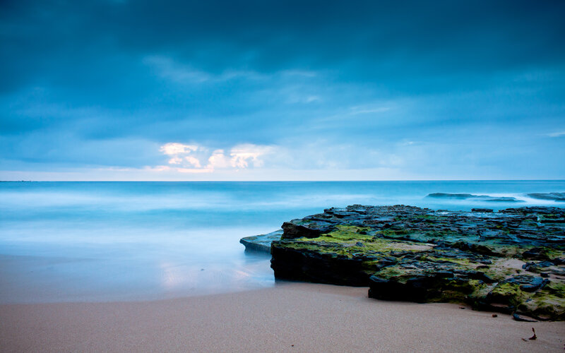 Rocky Beach at Dusk — Blue, Calm, Photograph