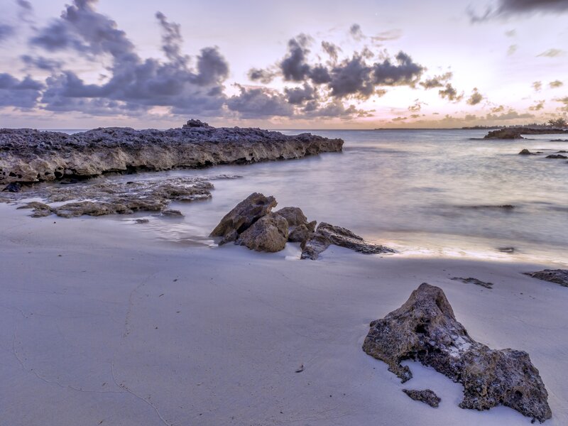 Rocky Beach at Dusk — Purple, Serene, Sunset, Photograph, Rocks, Sand