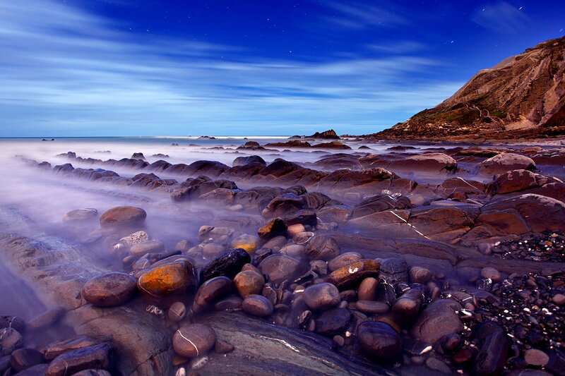 Rocky beach at night