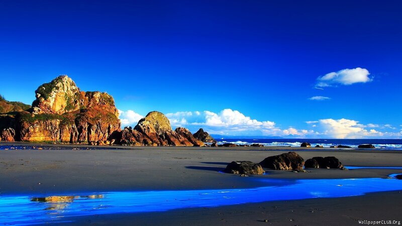 Rocky Beach at Ocean — Blue