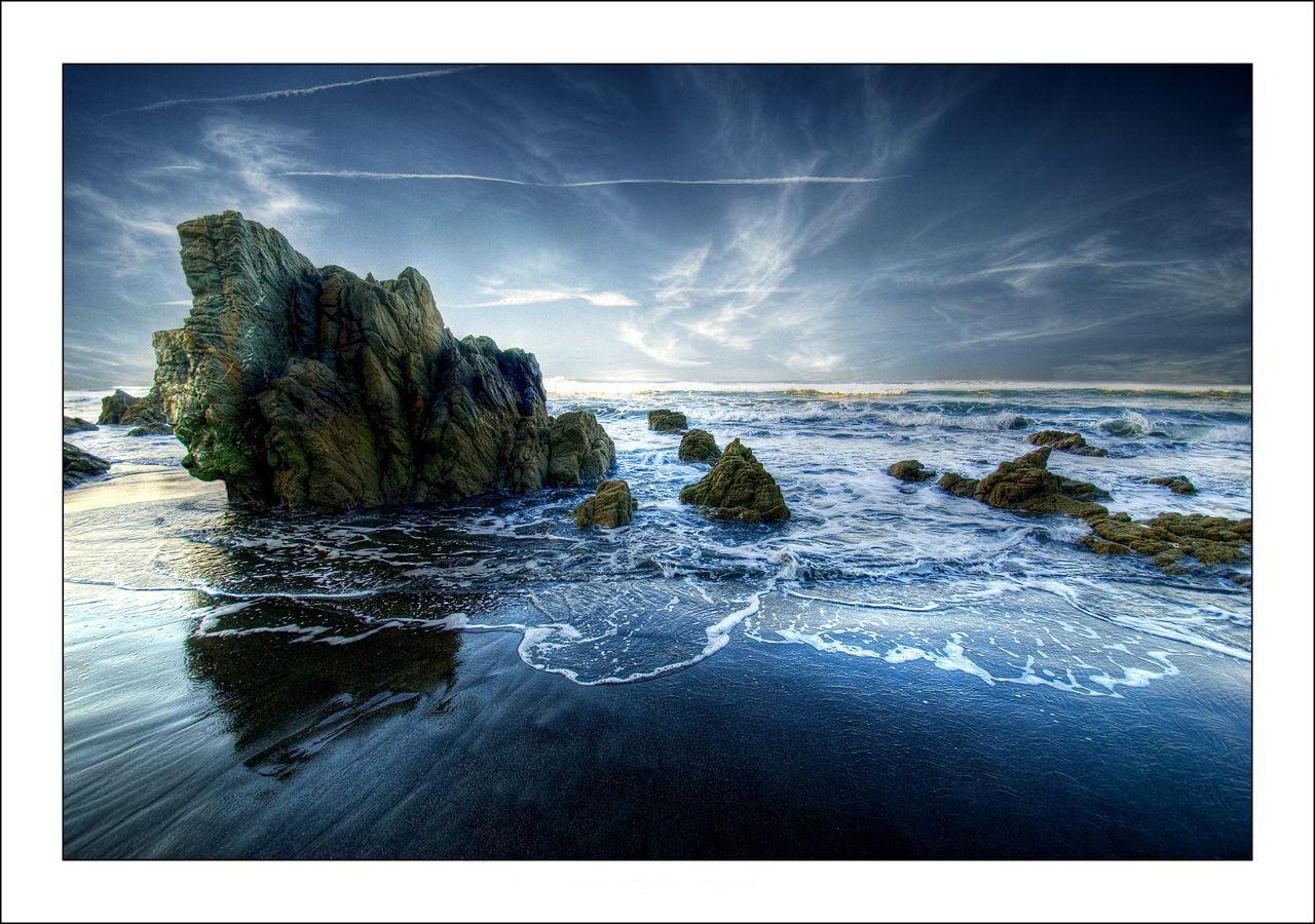Rocky beach at sunset