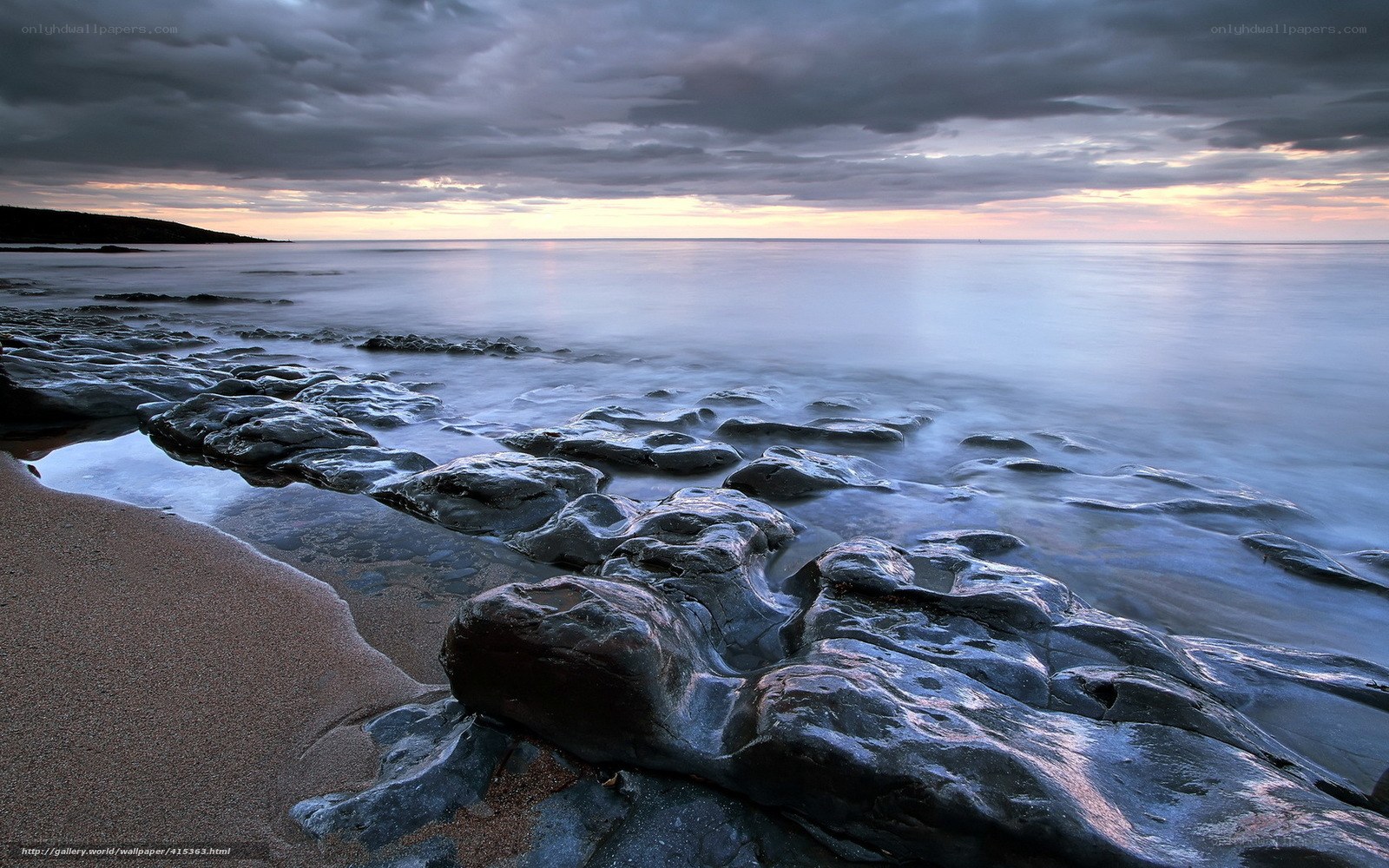 Rocky beach at sunset