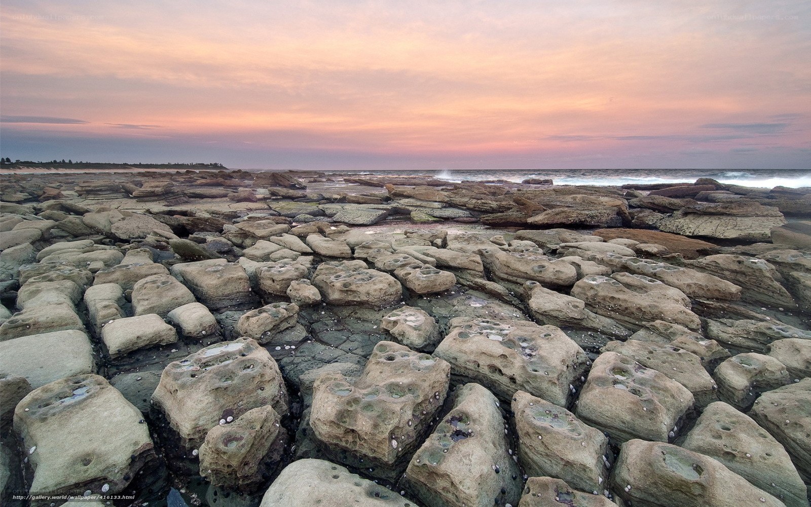 Rocky beach at sunset