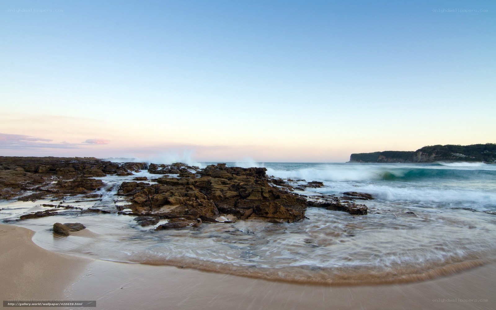 Rocky beach at sunset