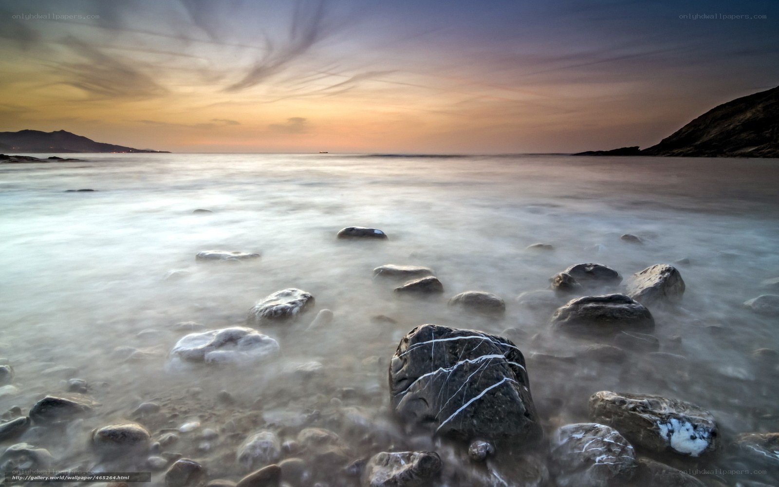 Rocky beach at sunset