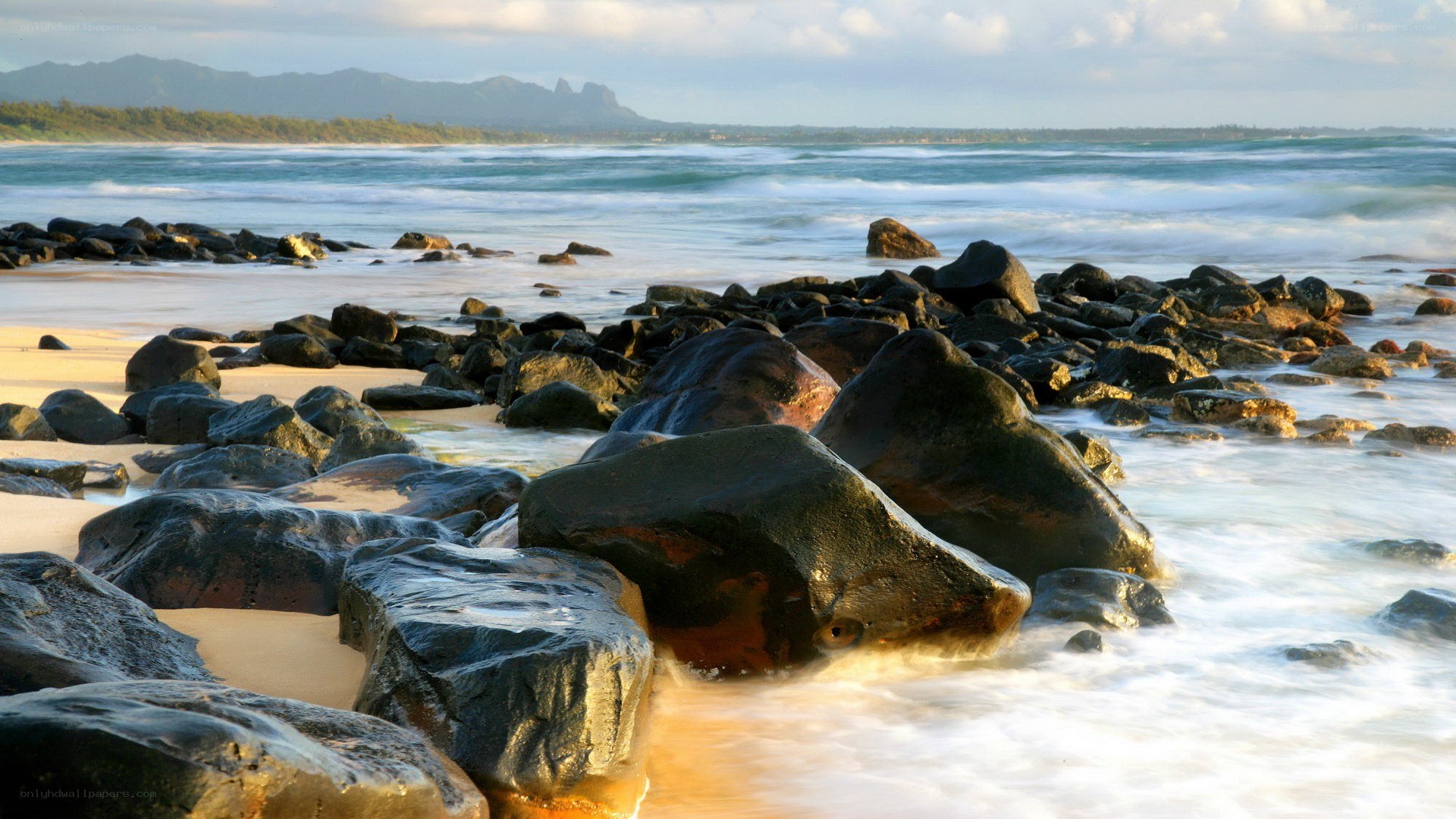 Rocky beach at sunset