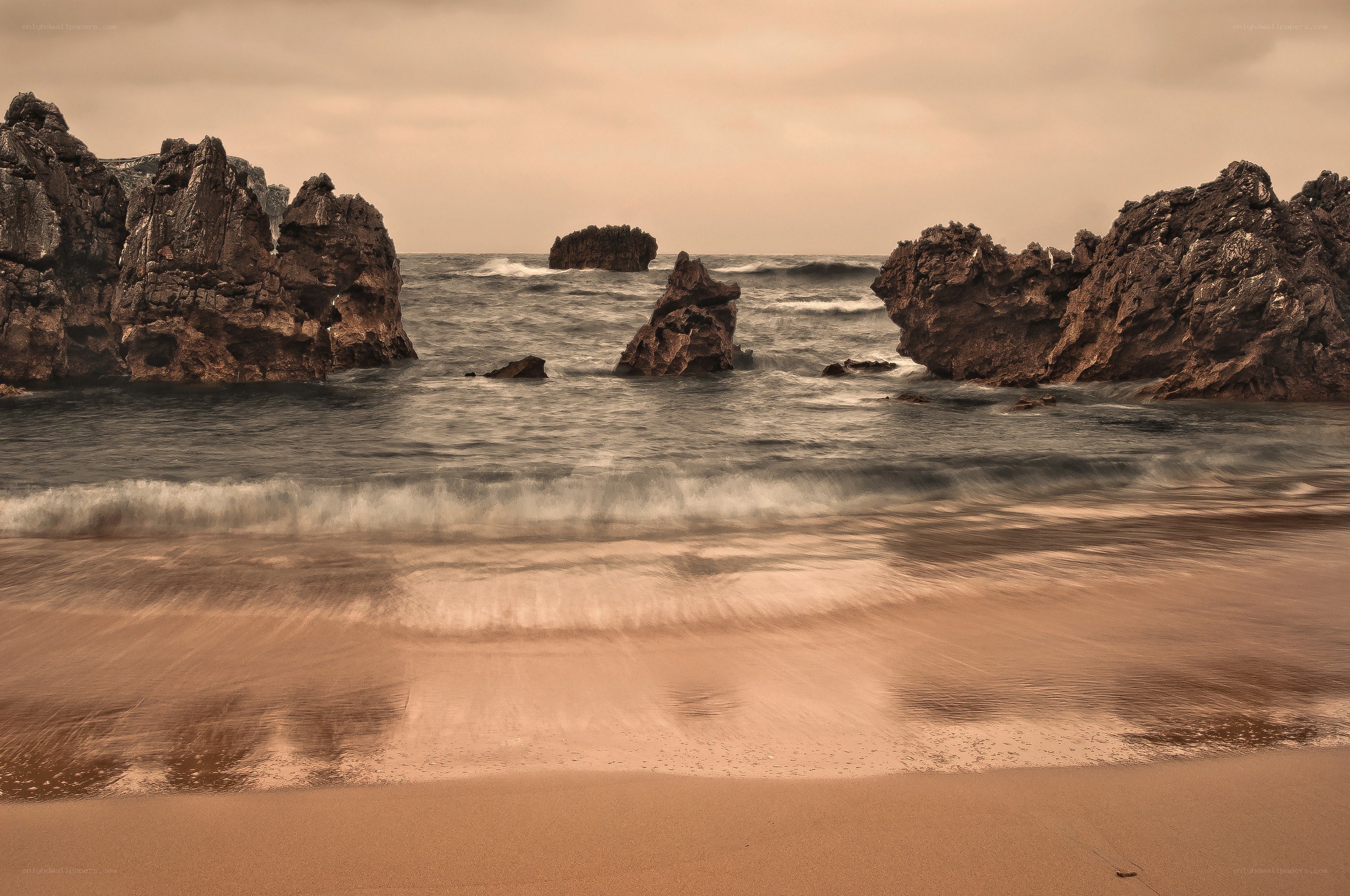 Rocky beach at sunset