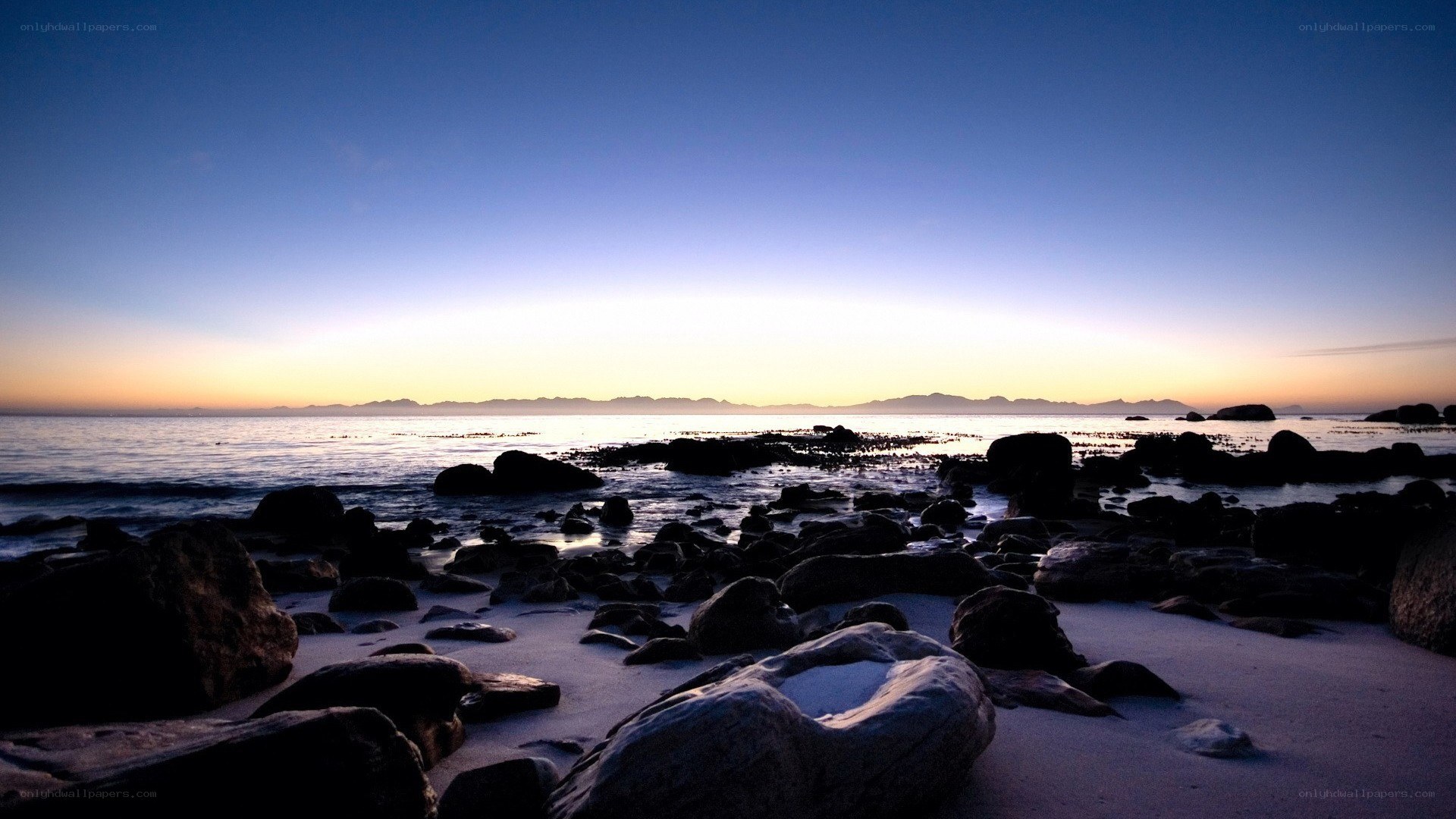 Rocky beach at sunset