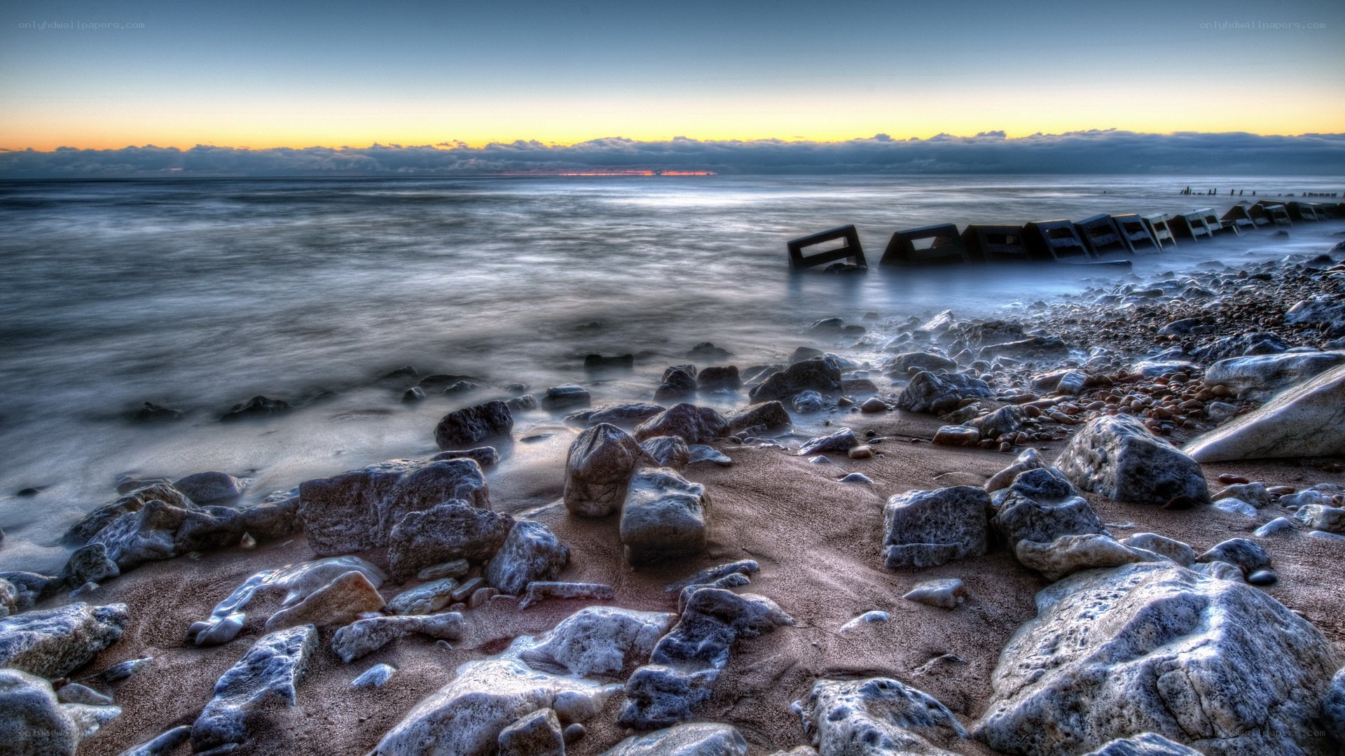 Rocky beach at sunset