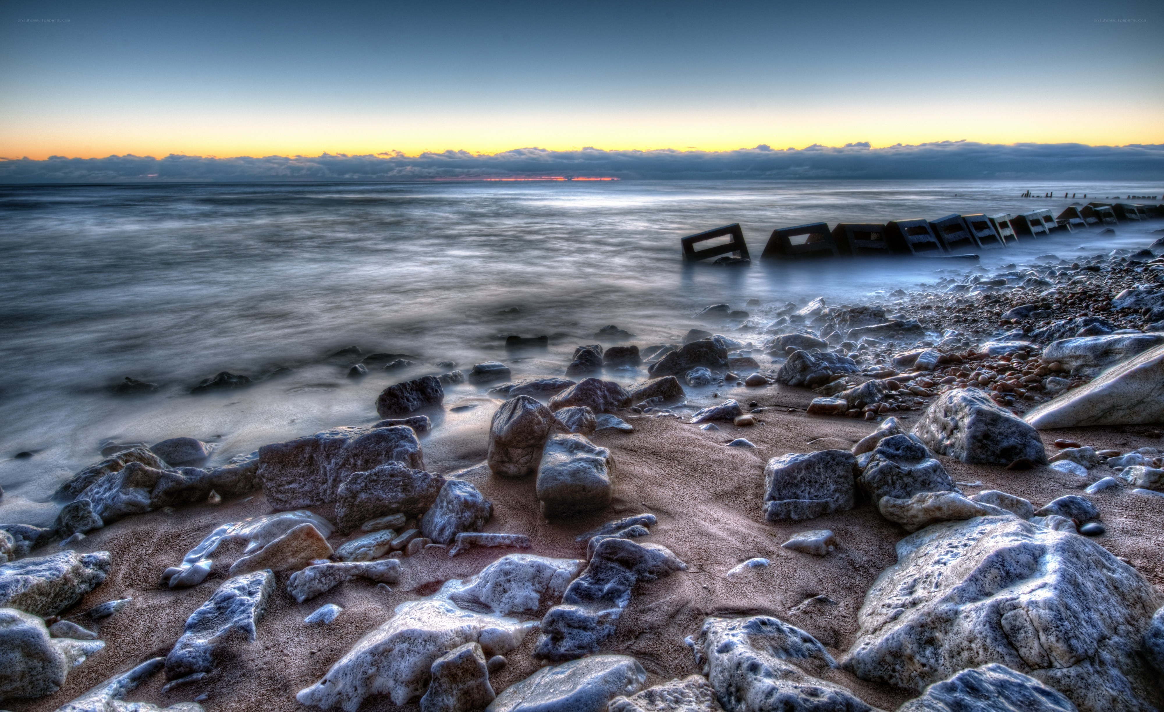 Rocky beach at sunset