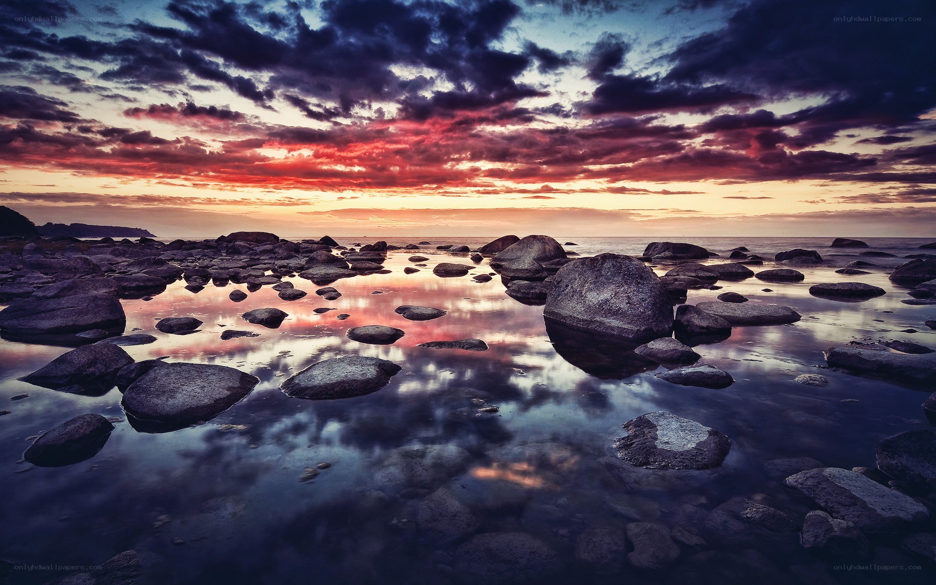 Rocky beach at sunset