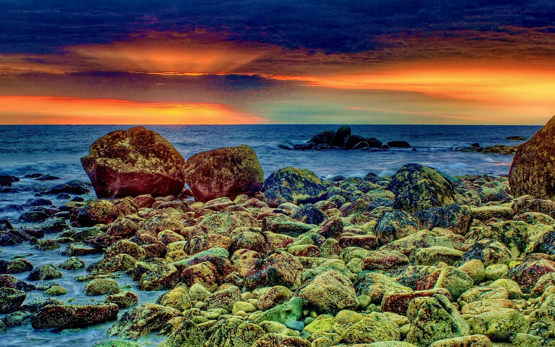 Rocky beach at sunset
