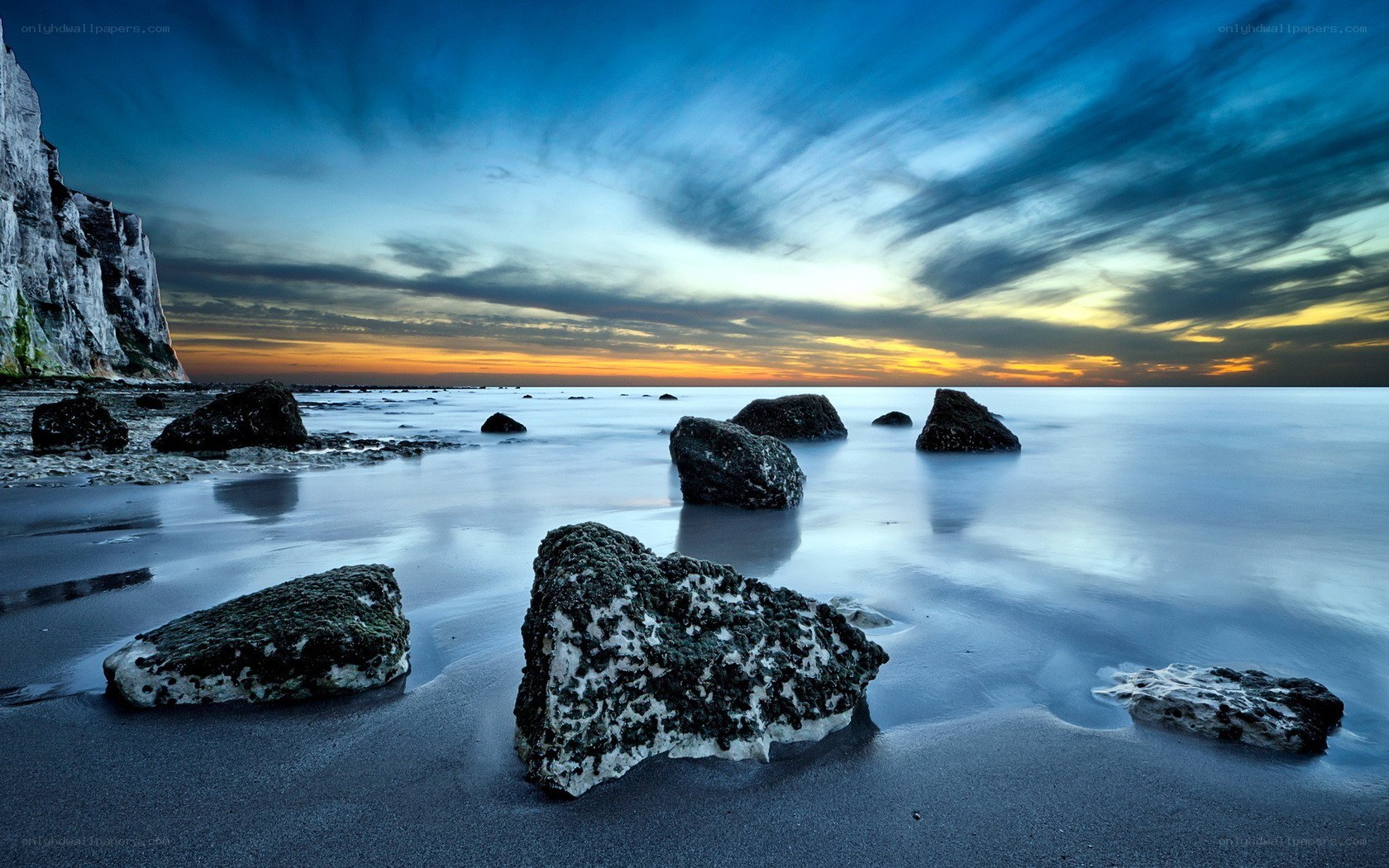 Rocky beach at sunset