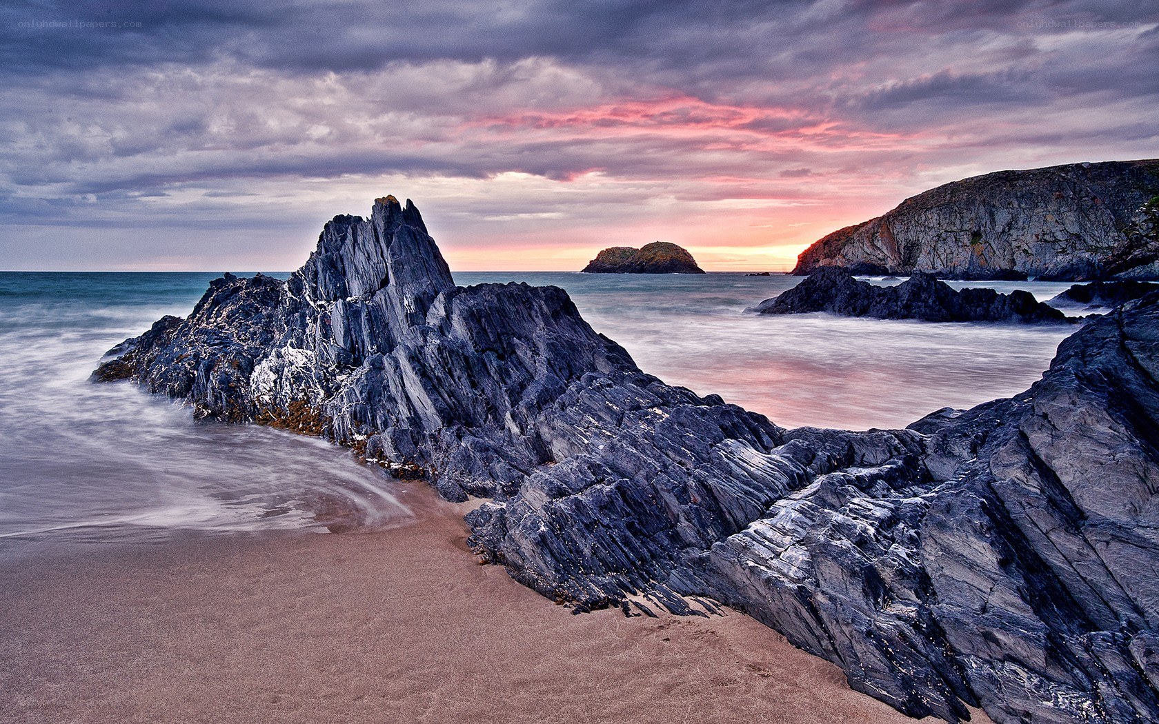 Rocky beach at sunset