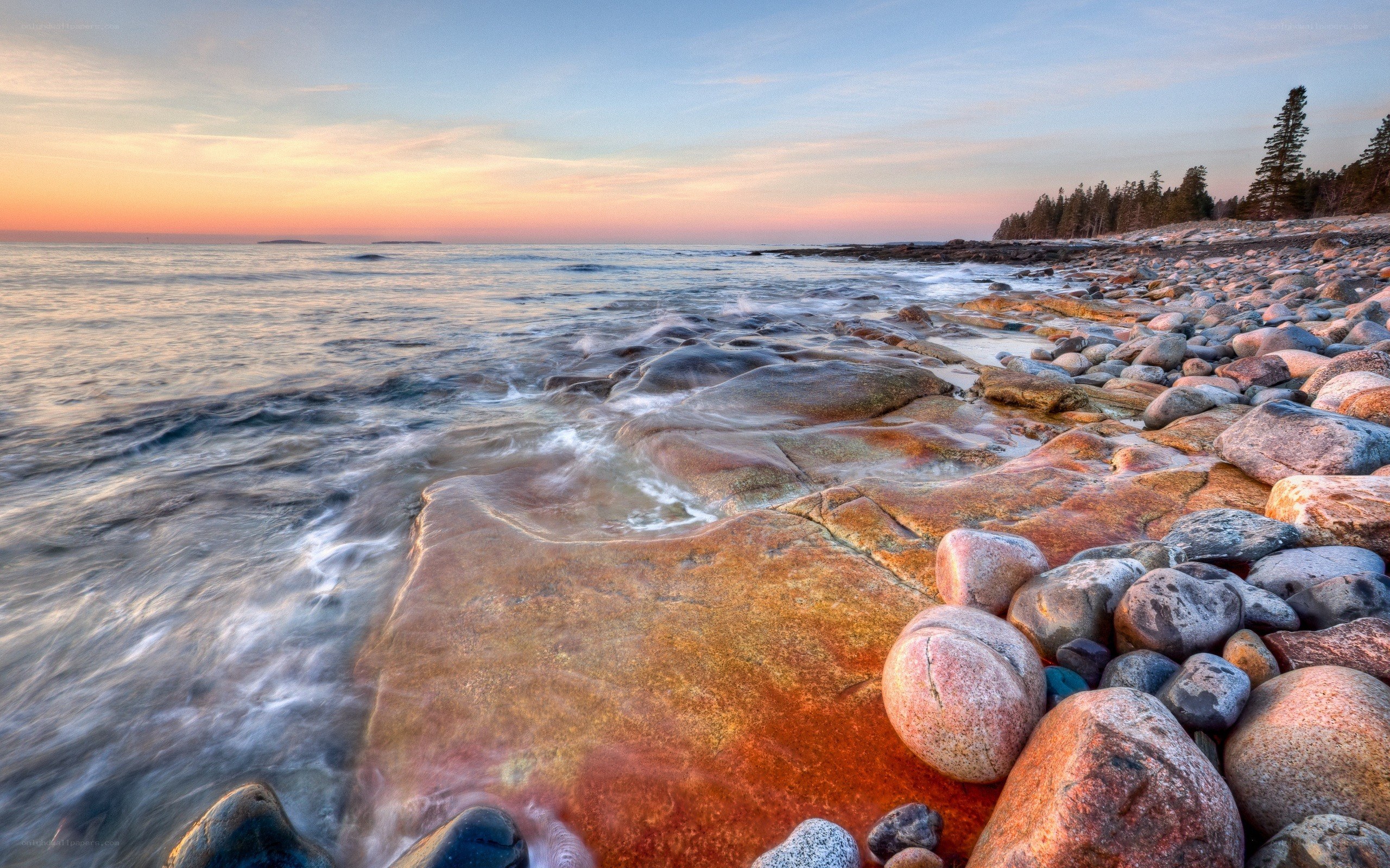 Rocky beach at sunset