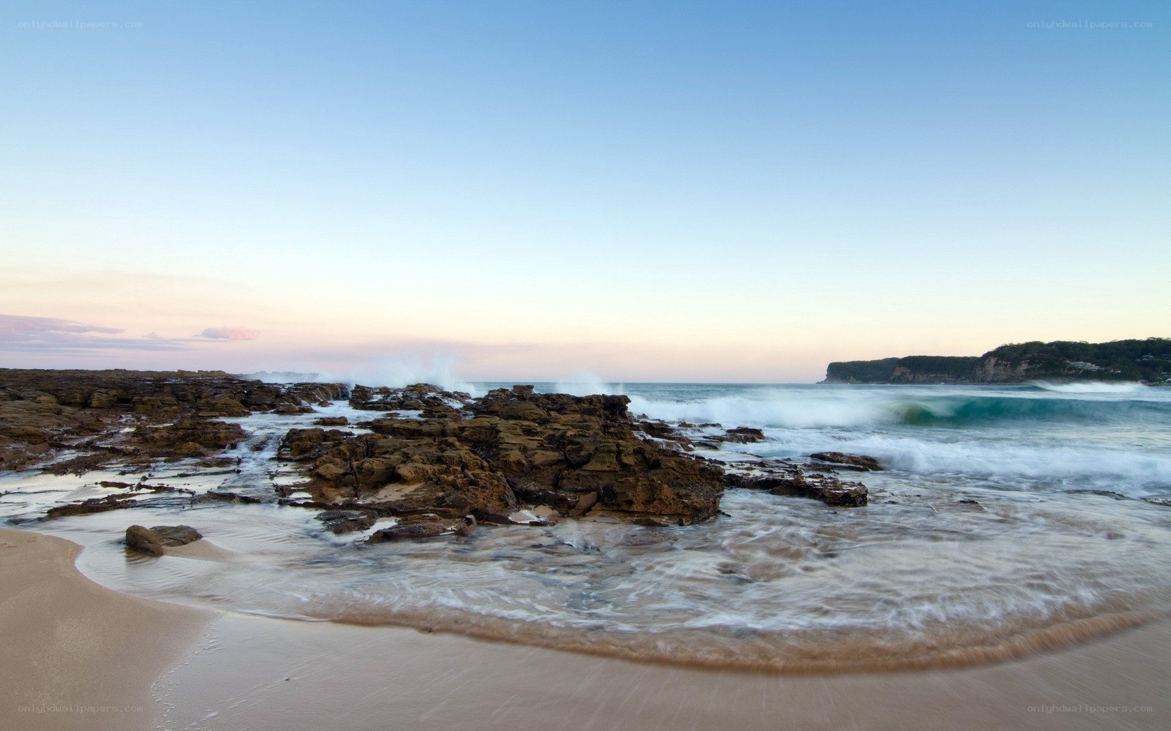Rocky beach at sunset