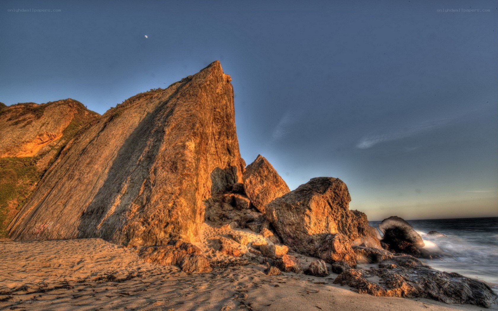 Rocky beach at sunset