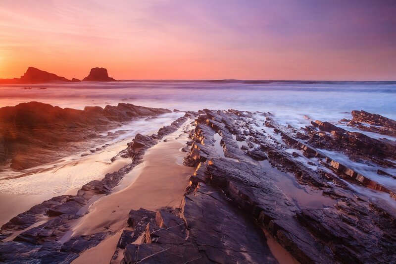 Rocky beach at sunset