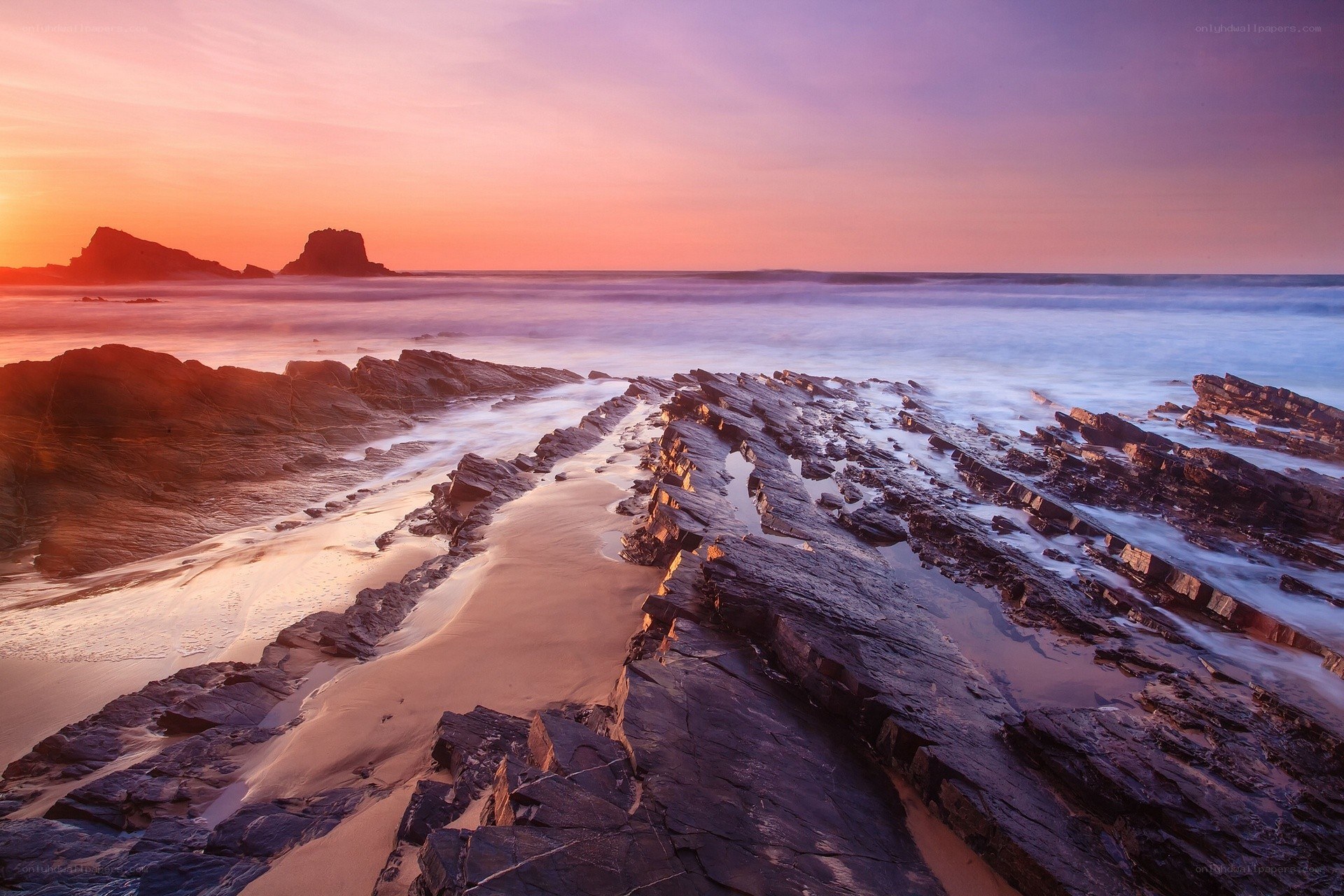 Rocky beach at sunset