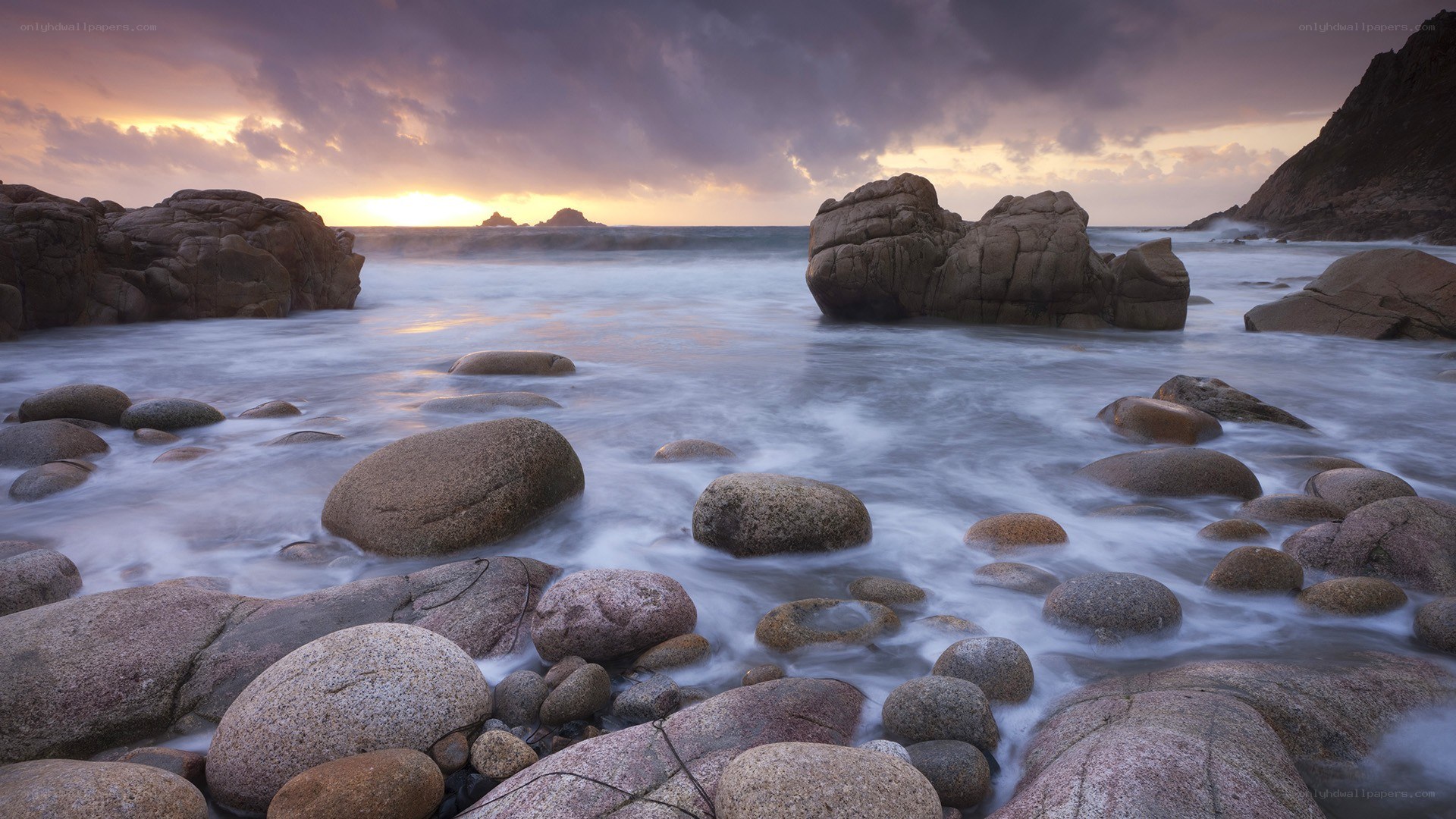 Rocky beach at sunset