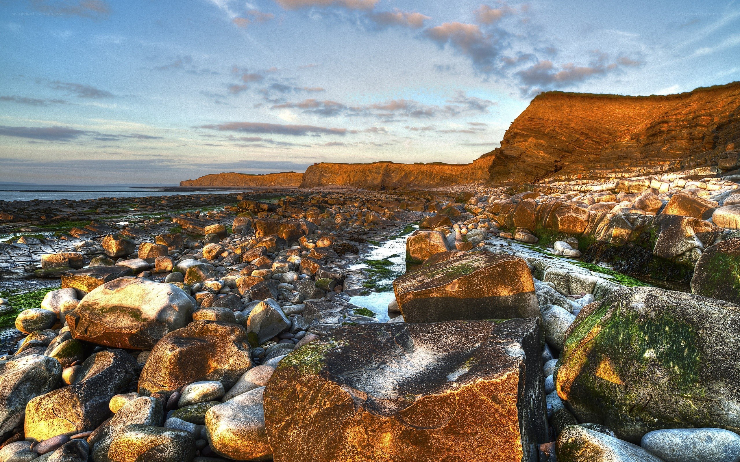 Rocky beach at sunset