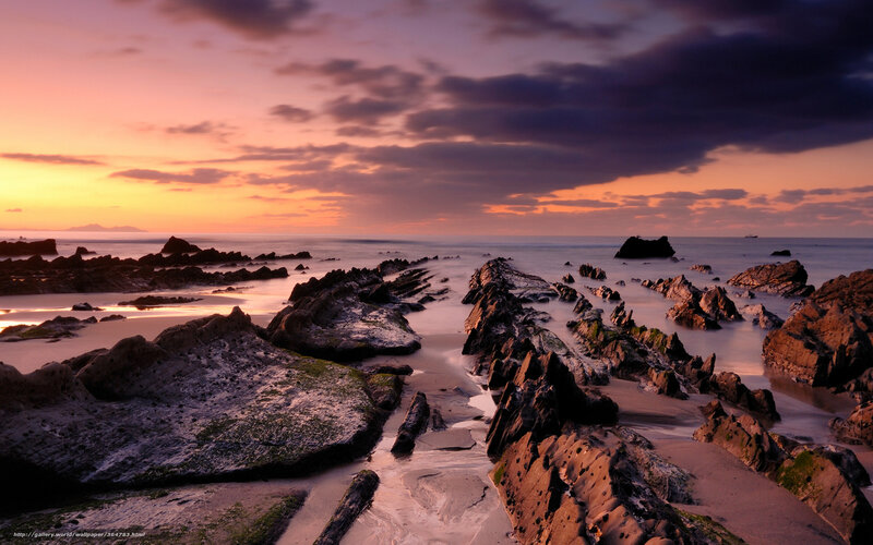 Rocky beach at sunset