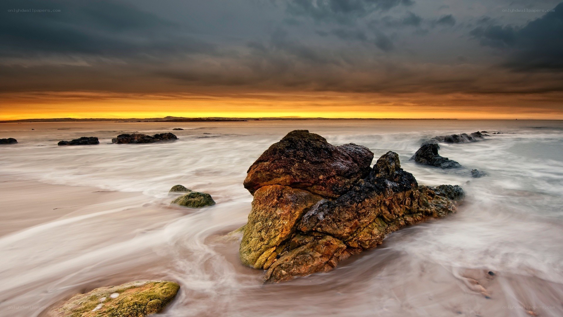 Rocky beach at sunset