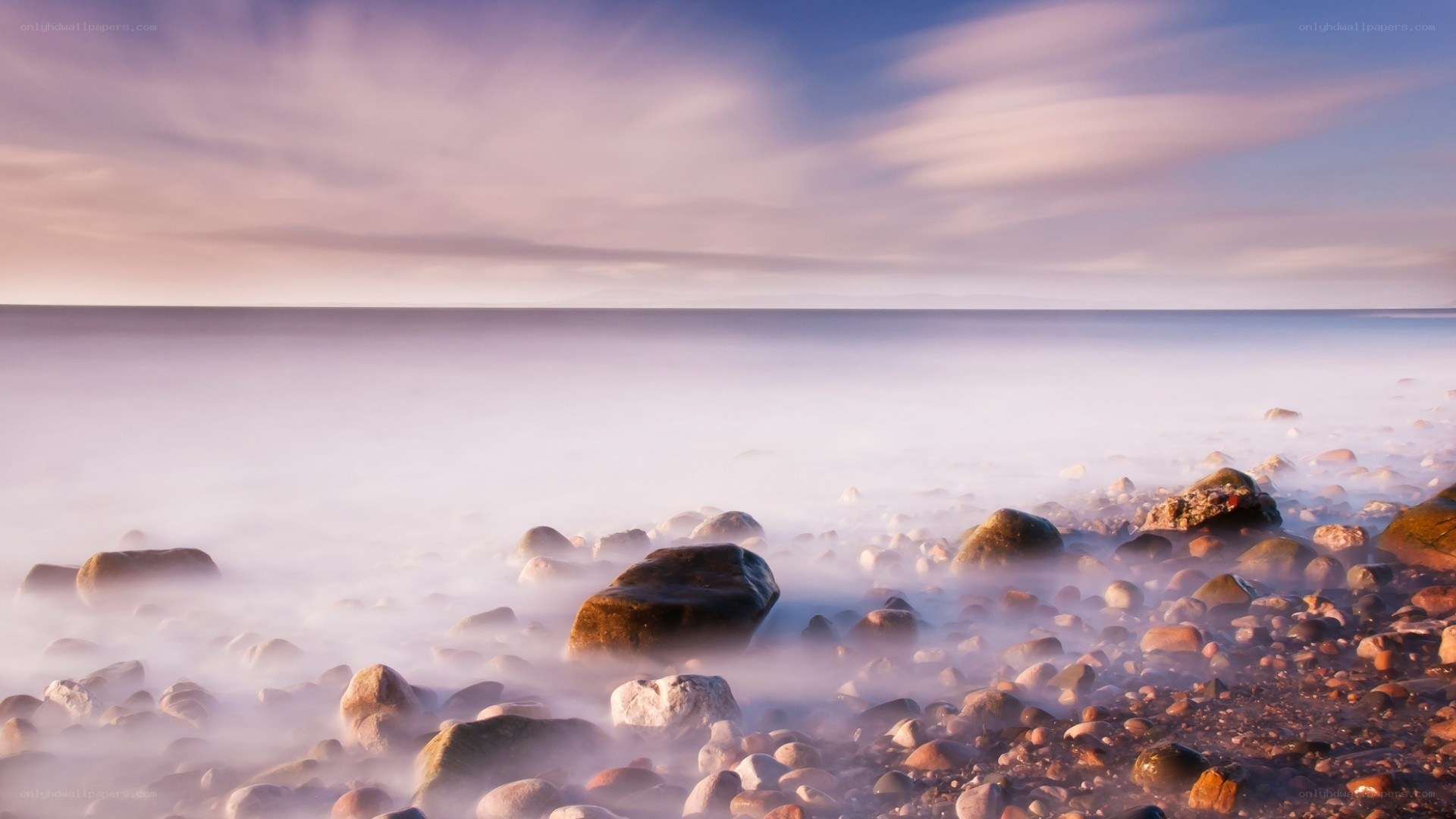 Rocky beach at sunset