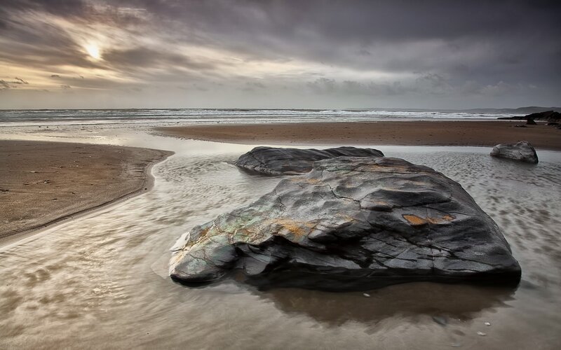 Rocky beach at sunset