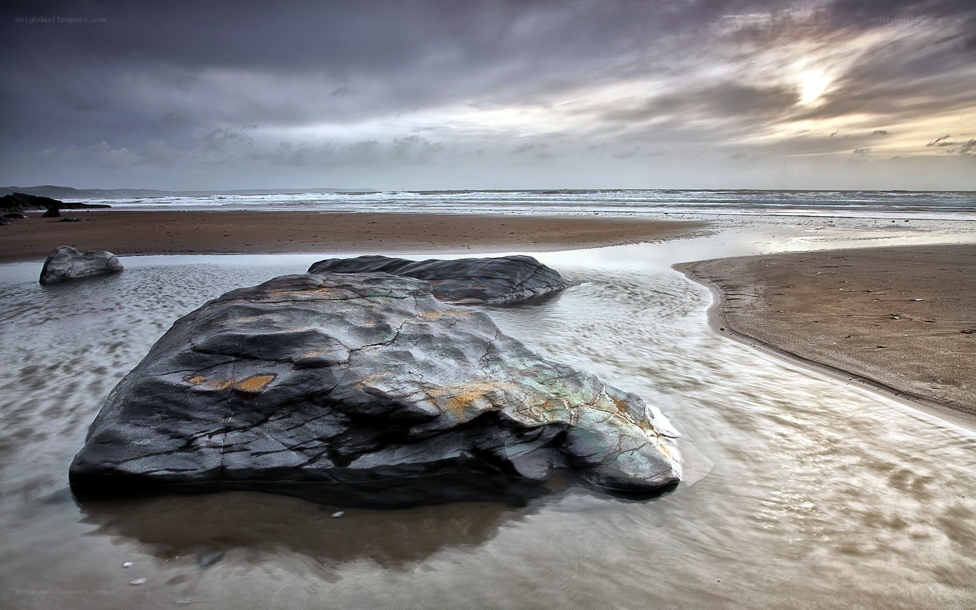 Rocky beach at sunset