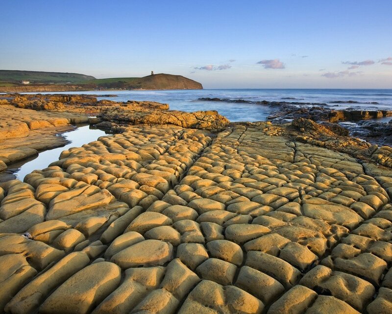 Rocky beach at sunset
