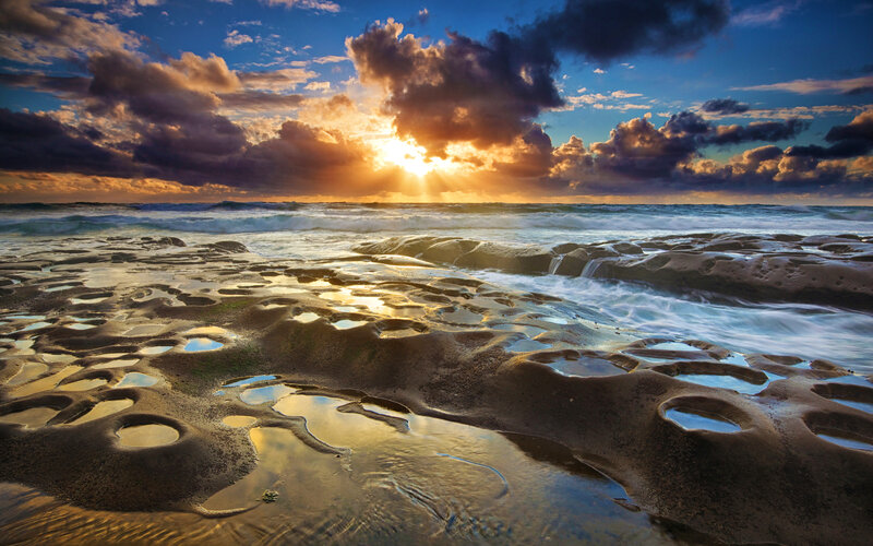 Rocky Beach at Sunset — Blue, Dramatic, Photograph, Ocean, Clouds, Sun