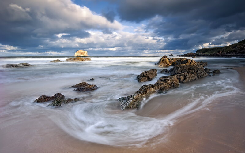 Rocky Beach at Sunset — Blue, Dramatic, Photograph, Rocks, Ocean, Clouds