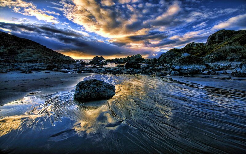 Rocky Beach at Sunset — Blue, Dramatic, Photograph, Rocks, Sand, Clouds
