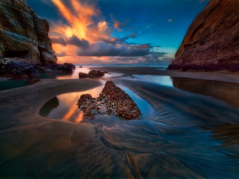 Rocky Beach at Sunset — Blue, Dramatic, Photograph, Rocks, Sand, Sky