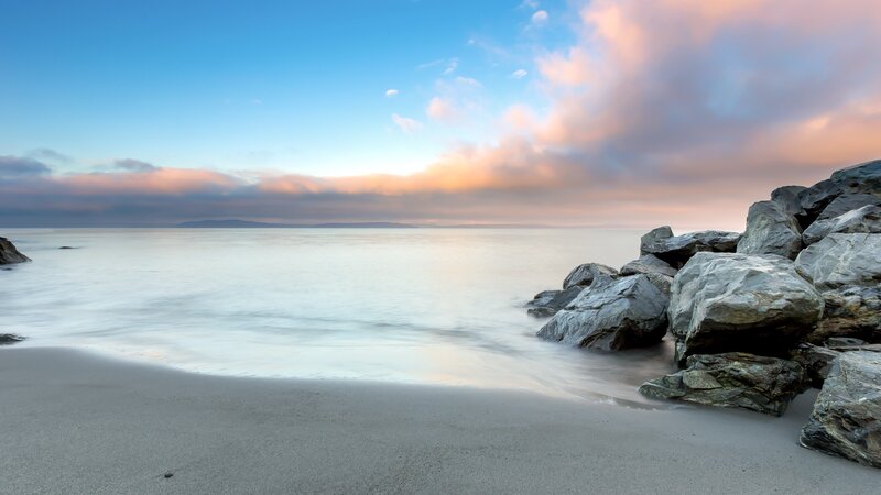 Rocky Beach at Sunset — Blue, Serene, Photograph, Rocks, Sand, Sea