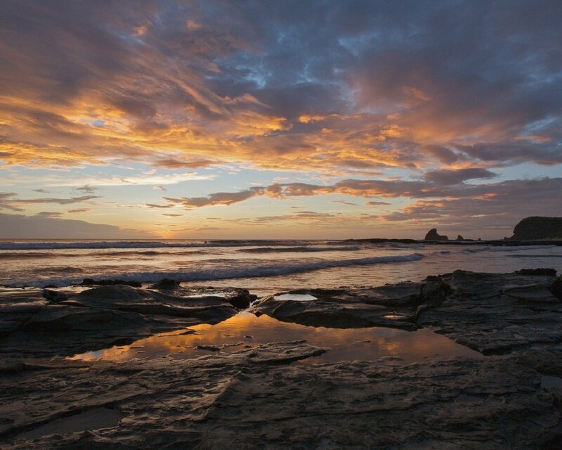 Rocky Beach at Sunset — Clouds