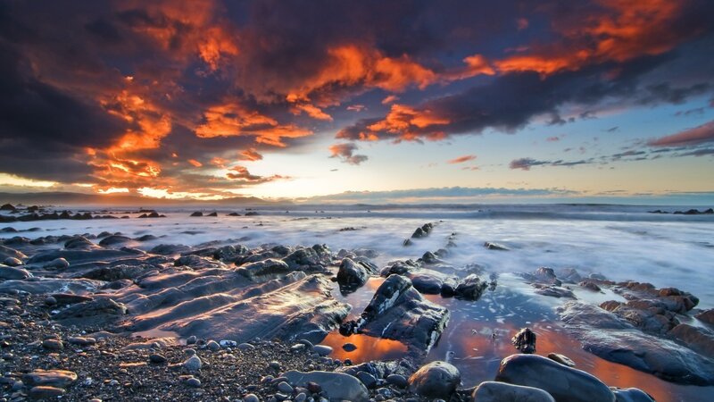 Rocky Beach at Sunset — Orange, Dramatic, Photograph, Rocks, Ocean, Sky, Clouds