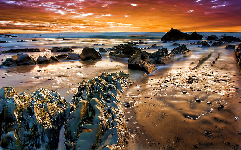 Rocky Beach at Sunset — Orange, Dramatic, Photograph