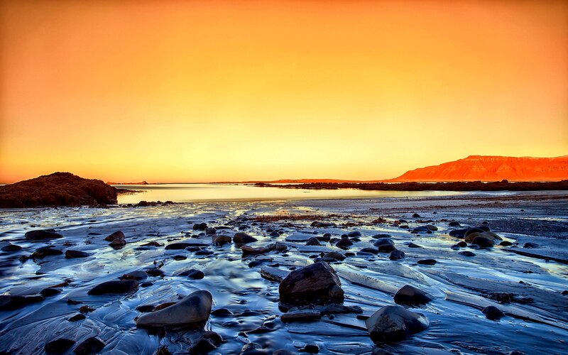 Rocky Beach at Sunset — Orange, Serene, Photograph, Rocks, Water