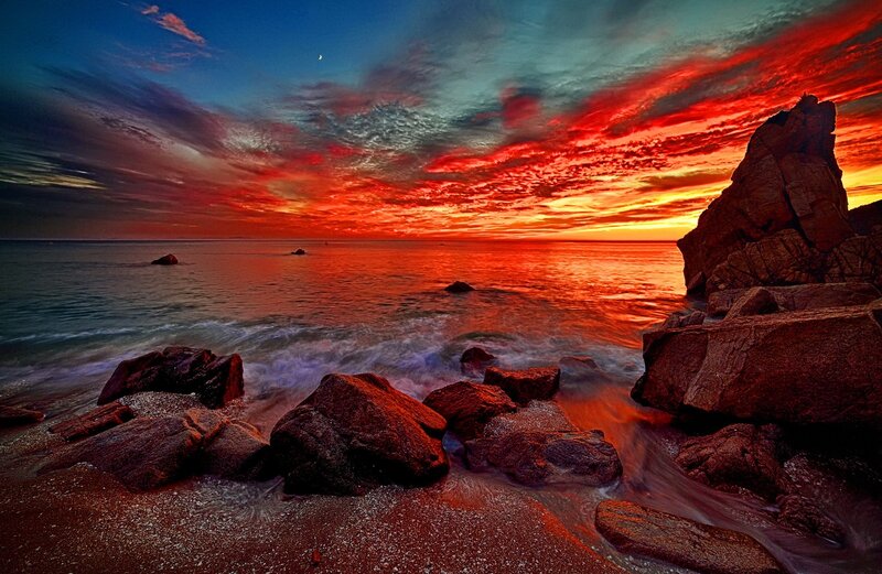 Rocky Beach at Sunset — Red, Dramatic, Photograph, Rocks, Ocean, Sky, Moon