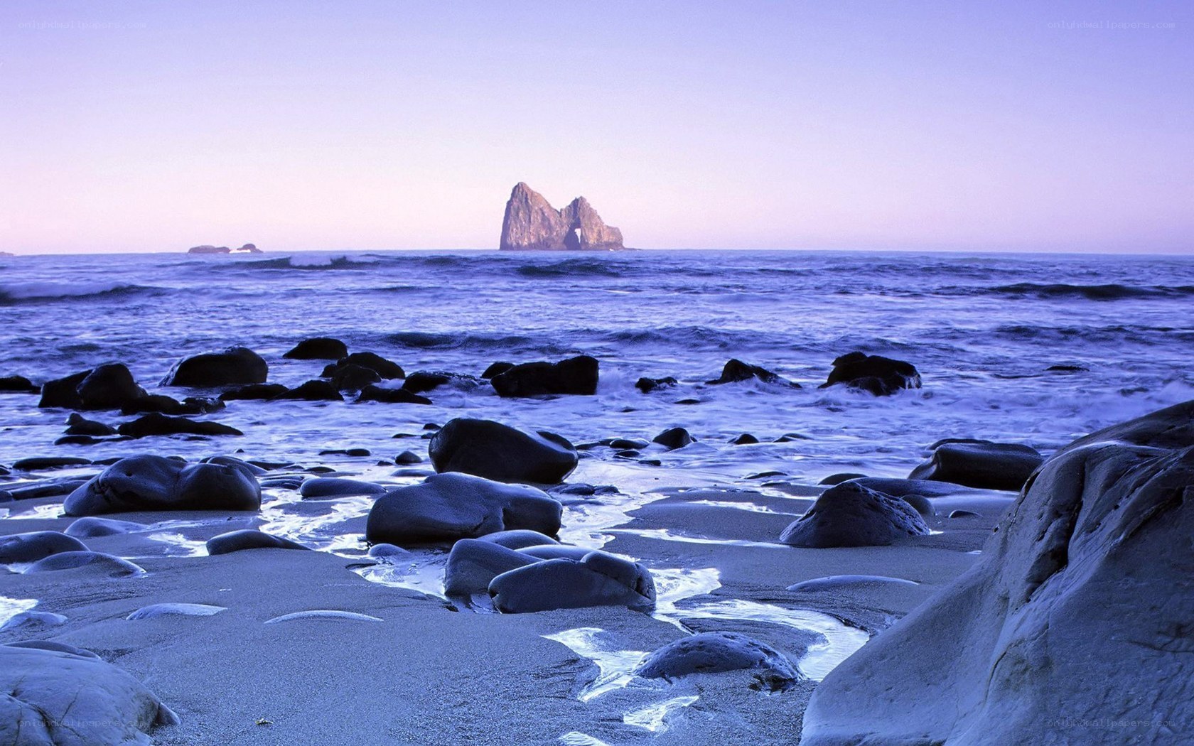 Rocky beach at twilight