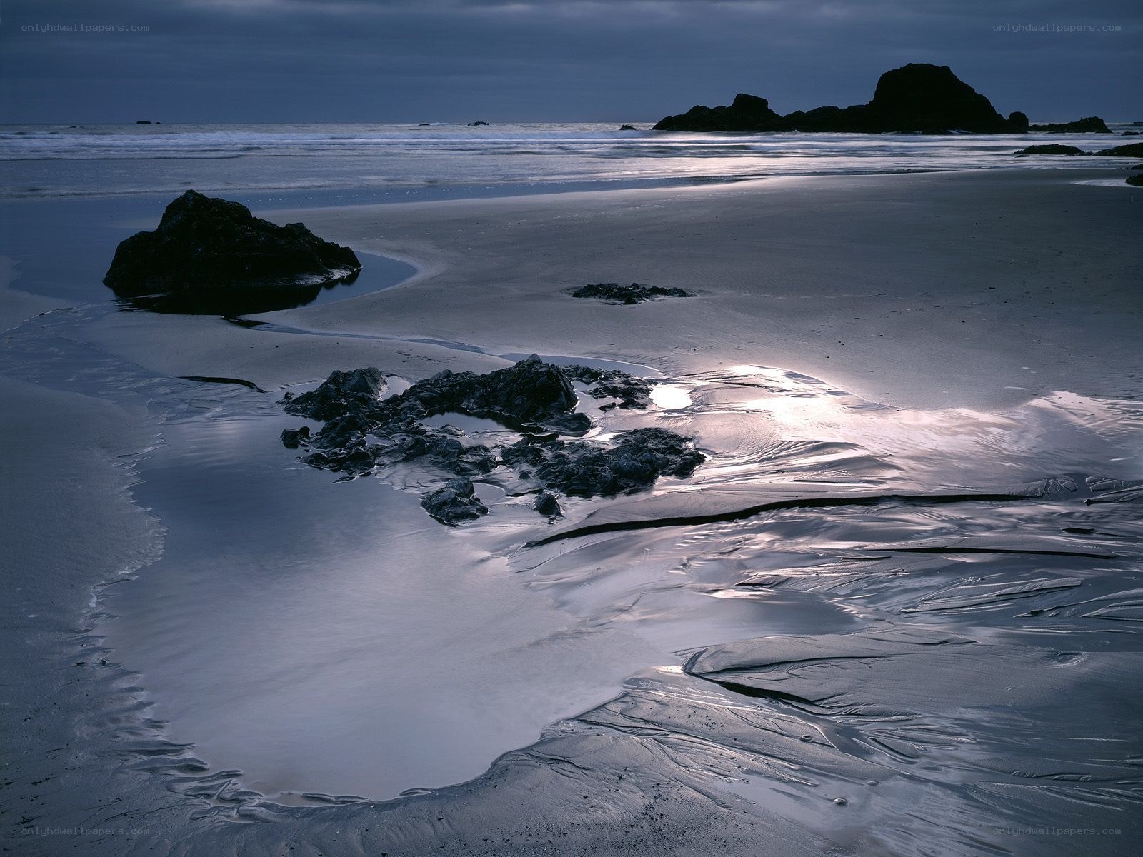 Rocky beach at twilight