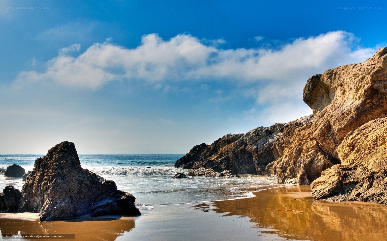 Rocky beach under blue sky