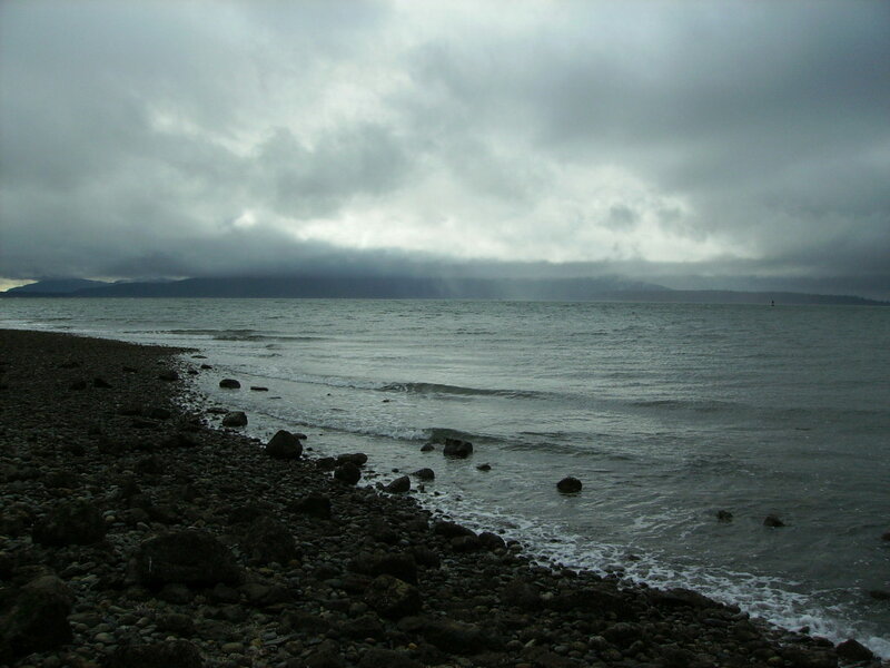 Rocky Beach under Storm Clouds