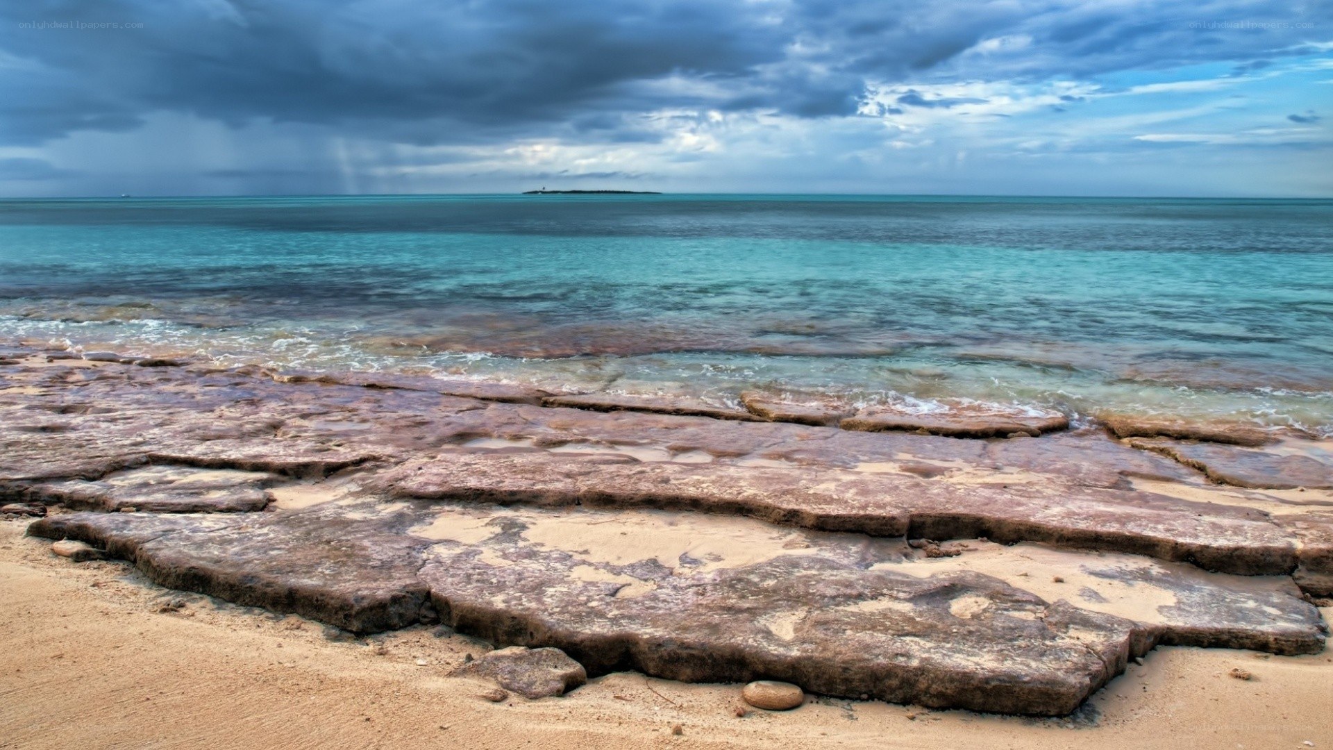 Rocky beach under stormy sky