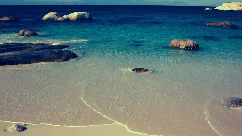 Rocky Beach with Clear Water — Blue, Serene