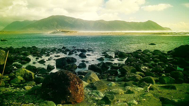 Rocky Beach with Mountains